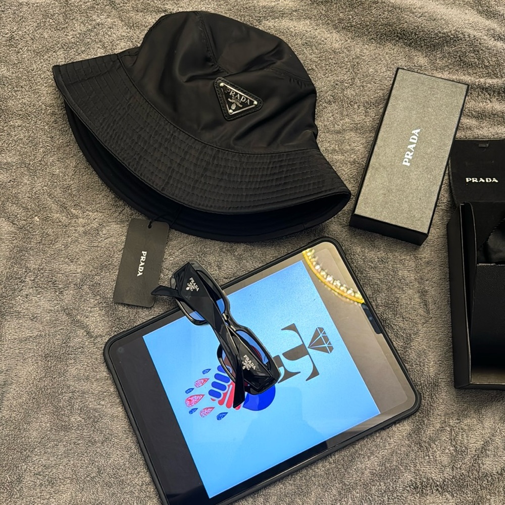Prada bucket hat and shades duo